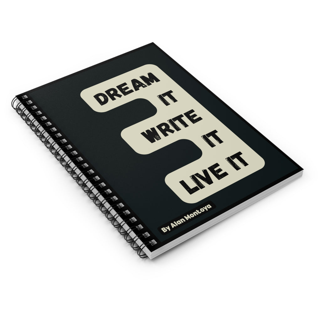 closeup Notebook with 'Dream It, Write It, Live It' motivation quote 